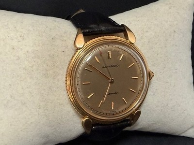 Movado 18k gold wristwatch. bumper. automatic. Swiss. antique/ vintage