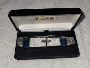 WILD HORSE CUSTOMS WHITE PEARL AND BLUE  CORELON CASE TRAPPER. #5 OF 10. SIGNED.