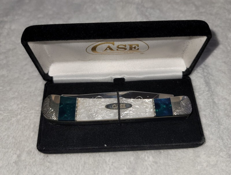 WILD HORSE CUSTOMS WHITE PEARL AND BLUE  CORELON CASE TRAPPER. #5 OF 10. SIGNED.