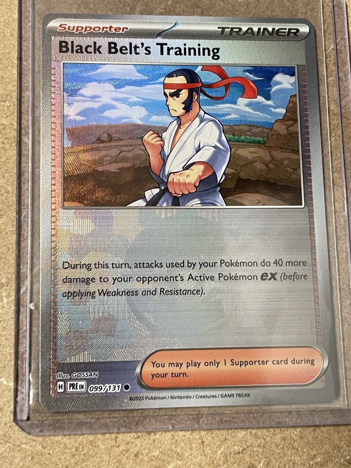Black Belt's Training Pokeball Holo 099/131 - NM Prismatic Evolutions Pokemon