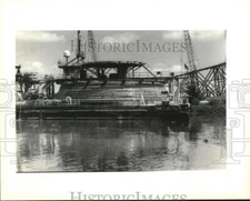 1995 Press Photo Global Industries' barge, Chickasaw, loaded with metal pipes