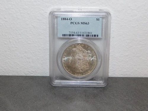 1884-O MORGAN SILVER DOLLAR GRADED MS63 BY PCGS.  FREE SHIPPING.
