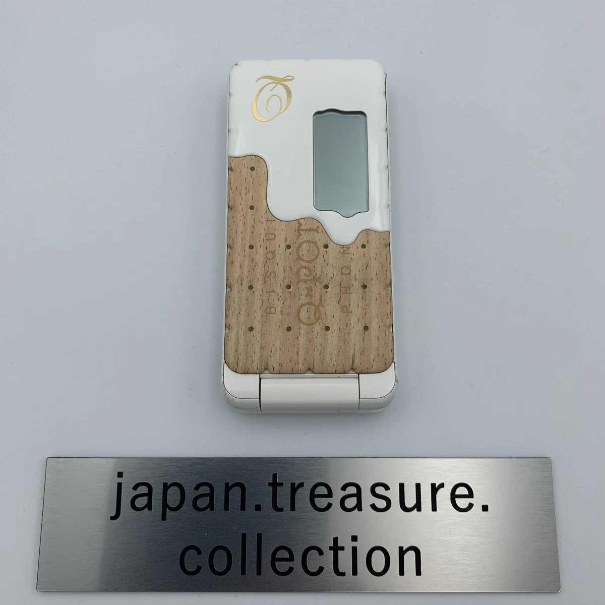 Docomo Q-pot. Phone SH-04C docomo チョコレートビスケット Sharp SH