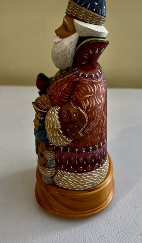 G Debrekht Merchant Santa With Boy Musical 51791 - Imagen 6 de 7