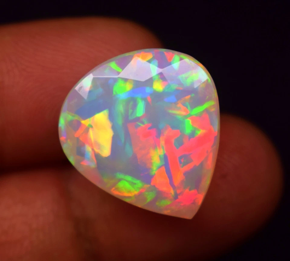 10.9 CT Multi Fire Natural Ethiopian Opal Pear Faceted Gemstone 20.2x18 mm - Image 2 of 4