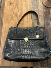 Brahmin black croc-embossed leather satchel with top handles and gold hardware.