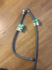 Pre-owned lot of 2 BrassCraft faucet connector supply lines.