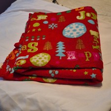Red Christmas Throw Blanket with Snowflakes, Trees, and Lettering Pattern