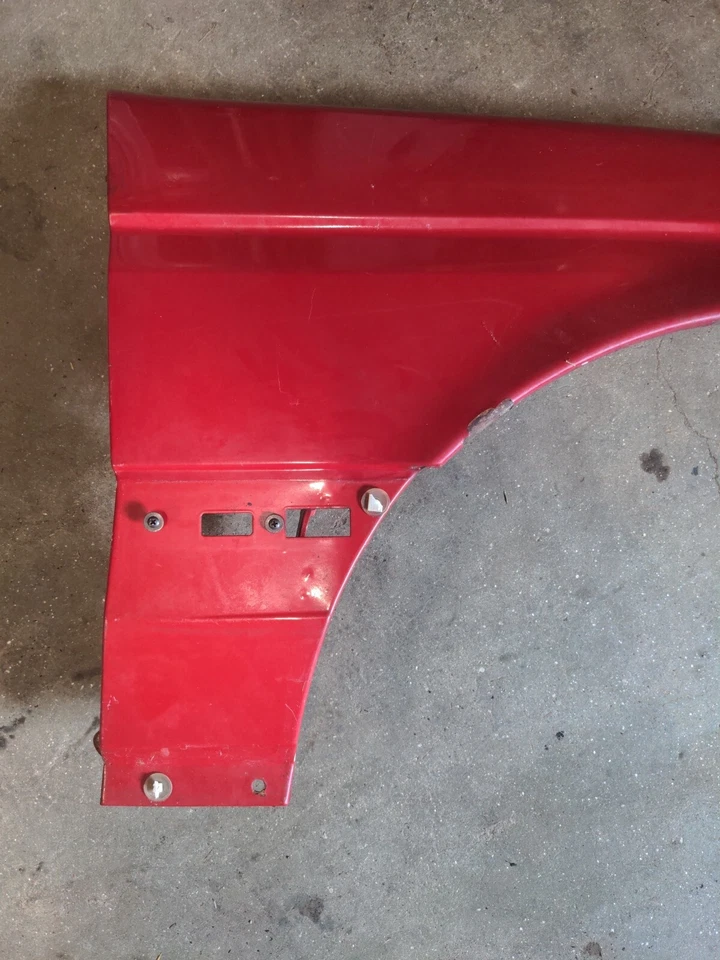 Guardabarros delantero pasajero Alfa Romeo 164 Foto 2 de 4