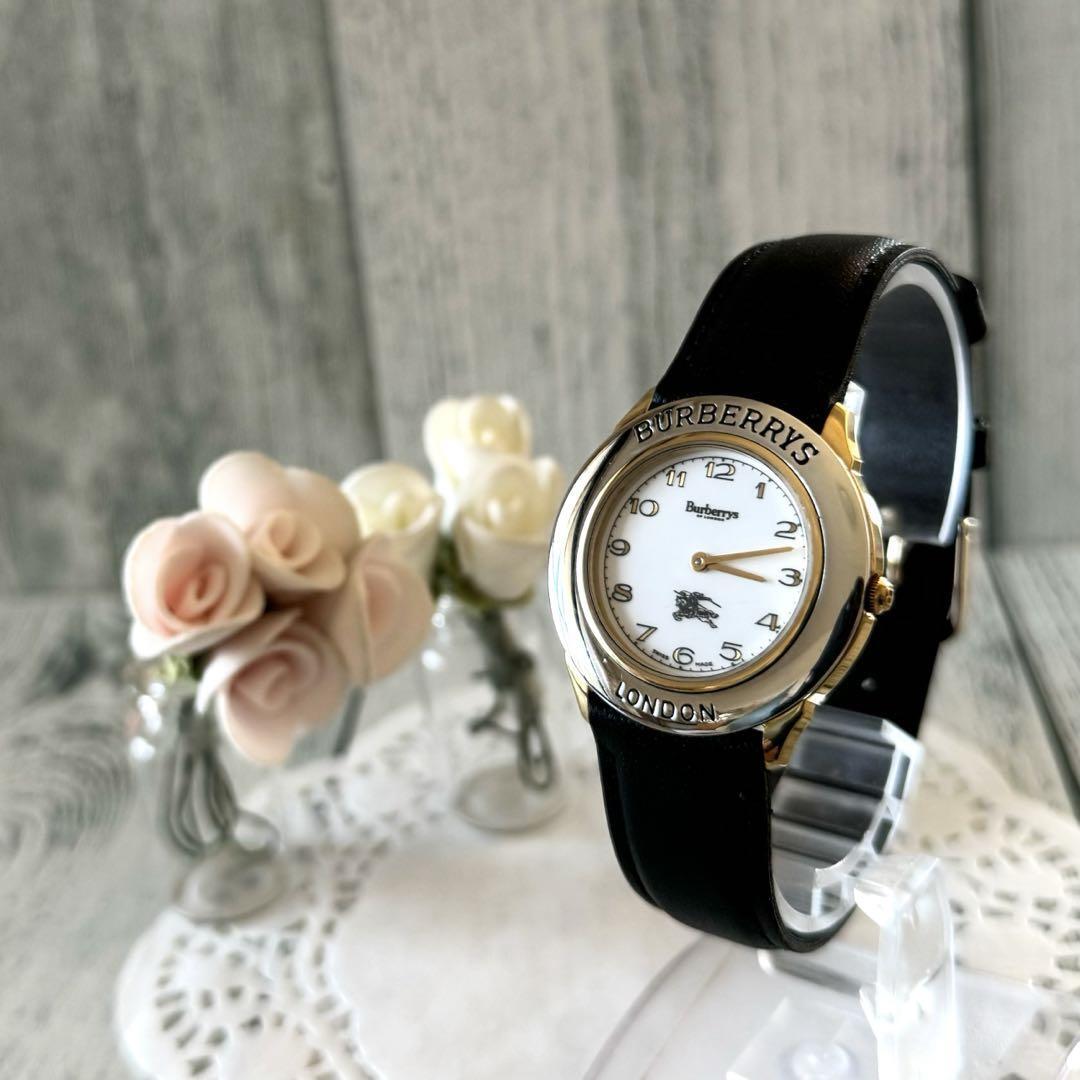 Burberry watch like new great condition!!! Burberry Womens Gold Chain Round Watch Great Condition  main image 2