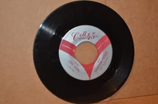CRIS KEVIN: HAUNTED HOUSE & HERE HE COMES THERE THEY GO; COLT 45 103 MINT- 45