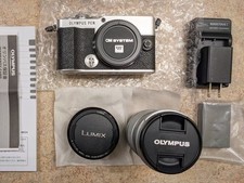 OLYMPUS PEN E-P7 40-150mm telephoto,  Panasonic 20mm F1.7 ii digital camera kit