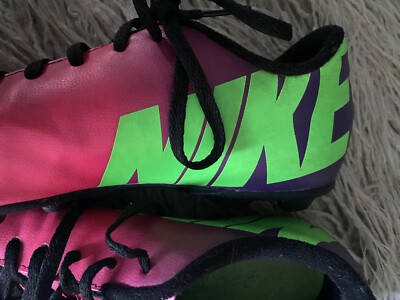 pink and green nike football boots