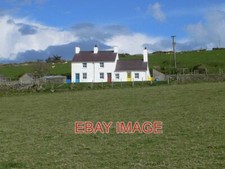 PHOTO  COTTAGES AT WEST END  TREFOR BRIGHTLY PAINTED COTTAGES AT THE FURTHEST WE