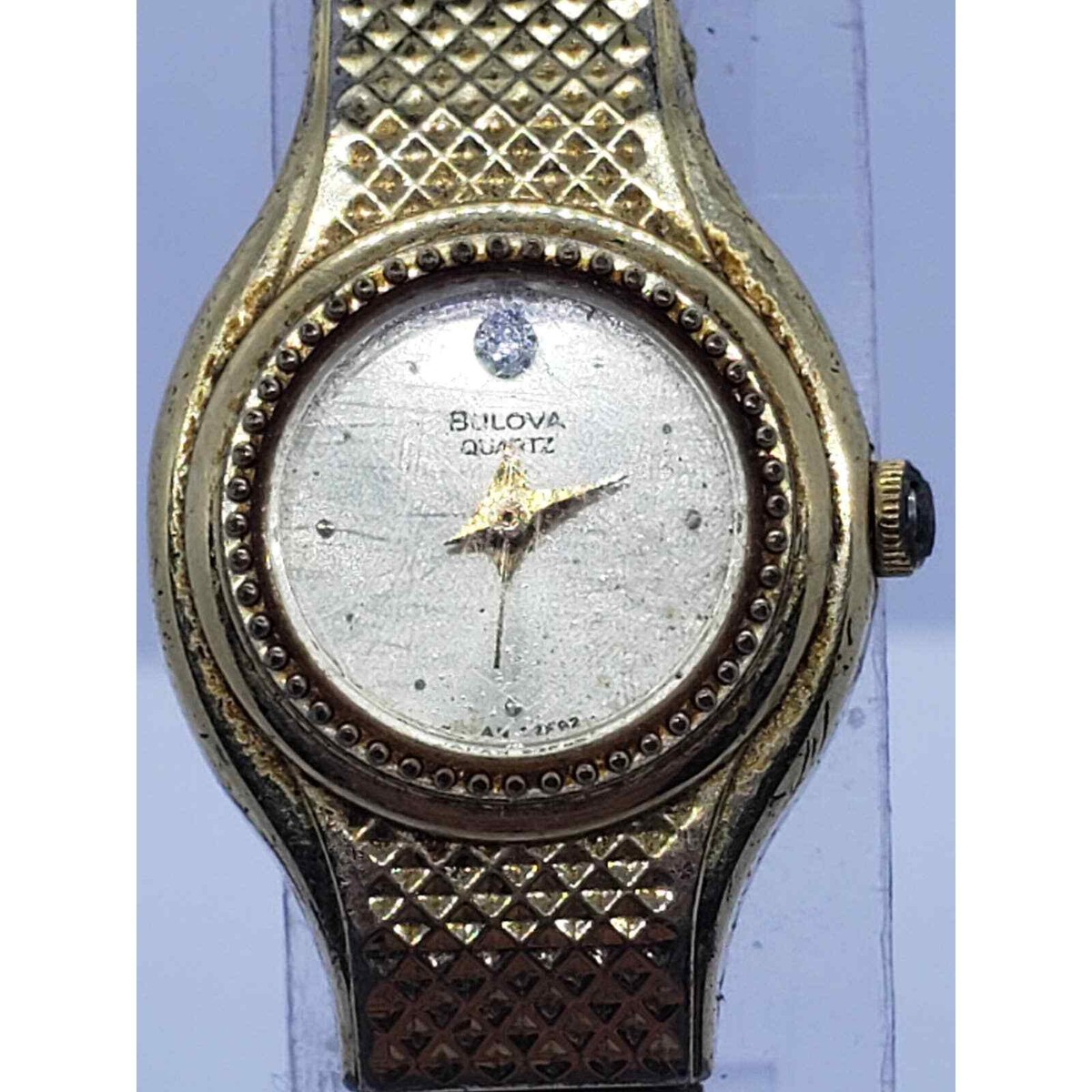 Bulova women\'s decorative dress watch, T0. Silver iridescent face with gold Bulova women main image 2