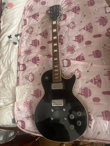 Black 70s Vintage Les Paul Encore electric guitar, no strings