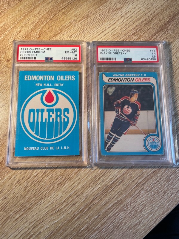 1979 o-pee-chee wayne gretzky #18 psa-1.5 and oilers emblem #82 psa-6
