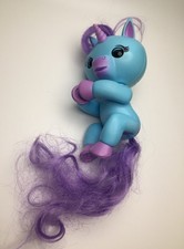 WowWee Fingerlings Baby Unicorn Blue Stella Interactive Toy Pet Pony Collectible