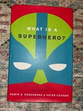 used books- What Is A Superhero? By Robin S. Rosenberg and Peter Coogan