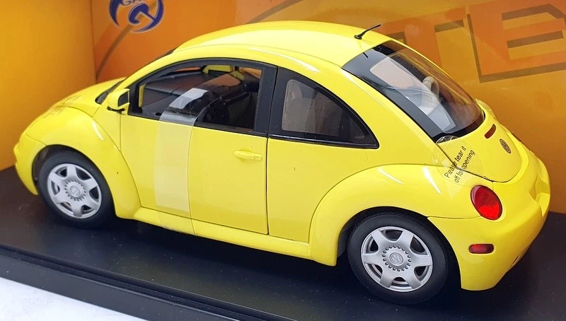 Puerta escala 1/18 diecast 01036 - VW nuevo Beetle cupé 1998 - amarillo Foto 2 de 4