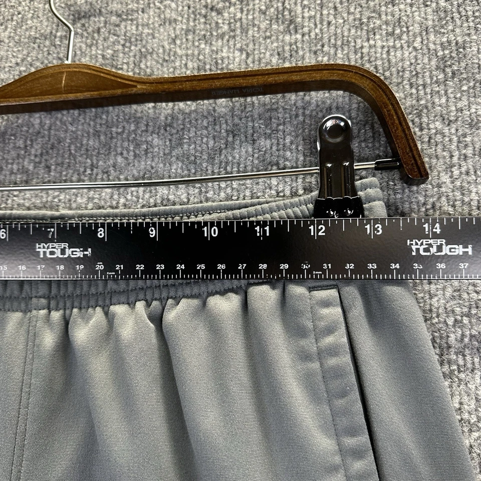 Pantalones deportivos Under Armour para jóvenes niños grandes grises sueltos Foto 4 de 4