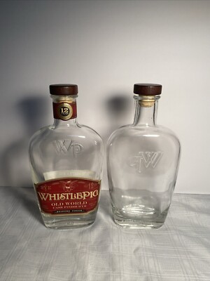 2 WHISTLEPIG 12 Year Old Cask Finish Rye Empty Bottles, One w/o Label.