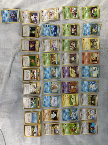 Unplayed Pristine Mint Japanese Pokemon Neo Genesis lot & 1st Edition Squirtle - Picture 1 of 3
