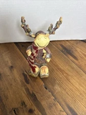 Tii Collections Christmas Skiing Reindeer Figurine with Logs & Scarf (HPT)