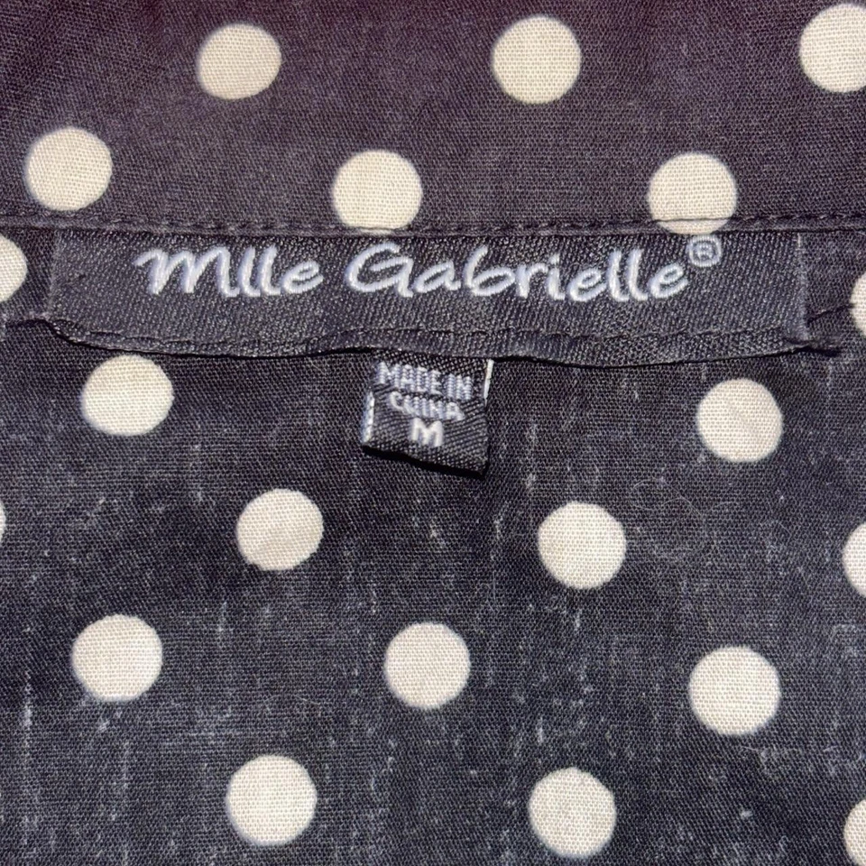 Vestido midi Mlle Gabrielle blanco y negro a lunares calce y acampanado estilo años 50 Foto 3 de 3