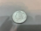 1881 Circulated Morgan Silver Dollar in very good condition
