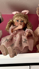Girl Baby Doll Blonde Curly Hair Blue Eyes Light Skin Pink Dress