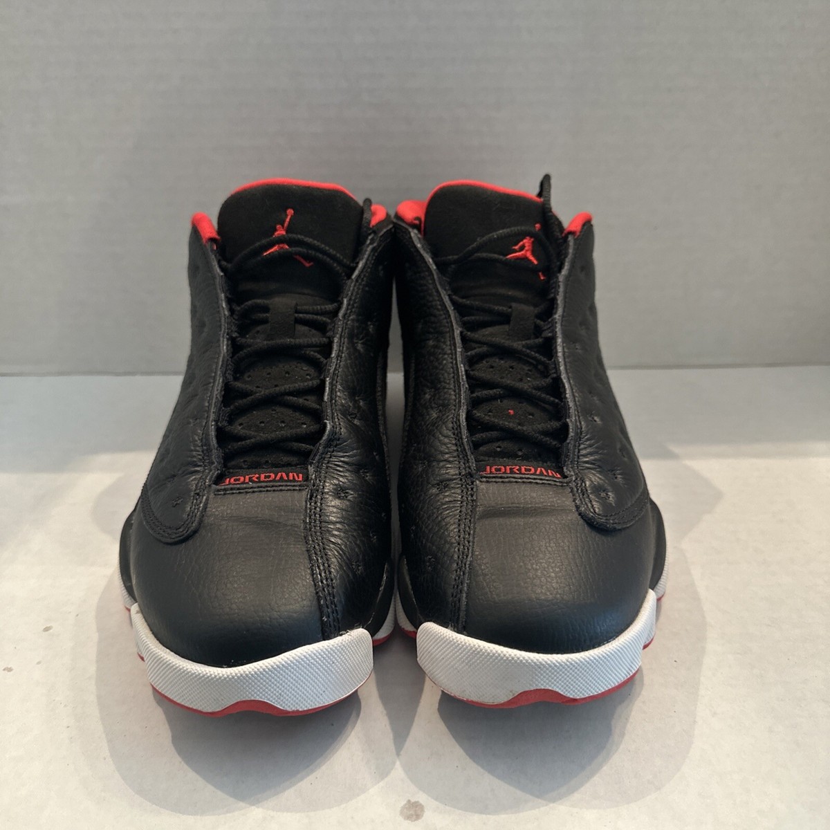 black red and gold jordan 13