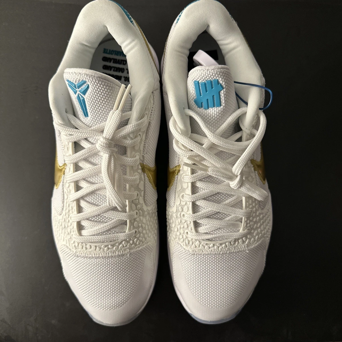 Nike zoom Kobe 5 ホワイト/ゴールド シューズ Preços baixos em Nike Undefeated x Zoom Kobe 5 Protro What If Pack