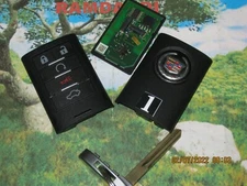 #1 OEM Cadillac Board CTS STS Remote Key Fob Transmitter KEY New Case 25943676