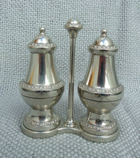 Vintage Ianthe silver Plate Salt and Pepper Set in a stand.
