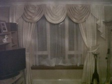 2 pairs professionally hand made curtains with 8 swags 4 tails and 4 tie backs 