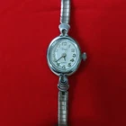 Timex Women’s Quartz Analog Oval Silver Metal Bracelet Watch White Dial