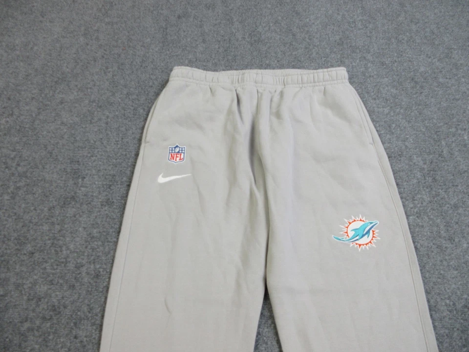 Pantalones deportivos Nike de fútbol americano emitidos por el equipo gris grande de los Miami Dolphins para hombre Foto 3 de 4