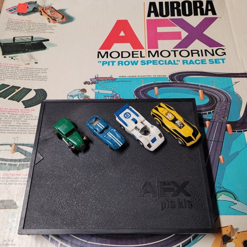 Aurora AFX pit row special HO slot car track with 4 cars and case 2 AFX 2 Aurora - Picture 1 of 24