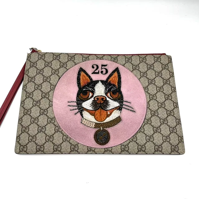11.04 24 Gucci Pre-Owned GG Supreme Bosco Clutch