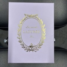 Portachiavi LADUREE Paris Macaron portachiavi viola Torre Eiffel con scatola nuovo mai usato