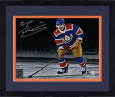 Framed Evan Bouchard Oilers Signed 8x10 2023 Heritage Classic with Puck Photo