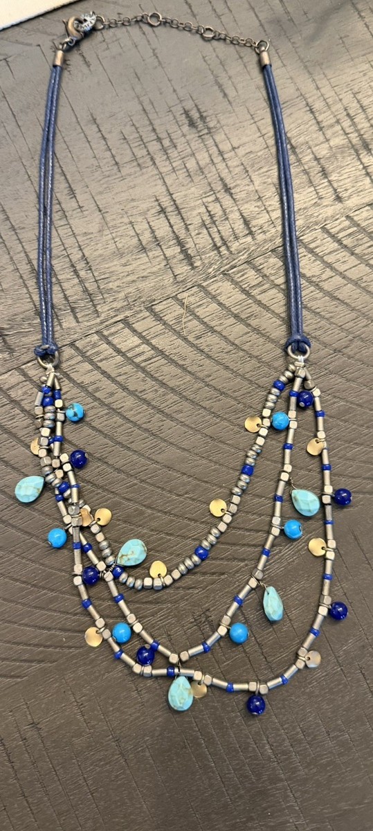 Karma Bella,tiered, multi-strand mixed materials Navy cord, beads, and stone