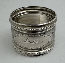 A Fabulous Antique Bright Cut Engraved Sterling Silver Napkin Ring “MOTHER”