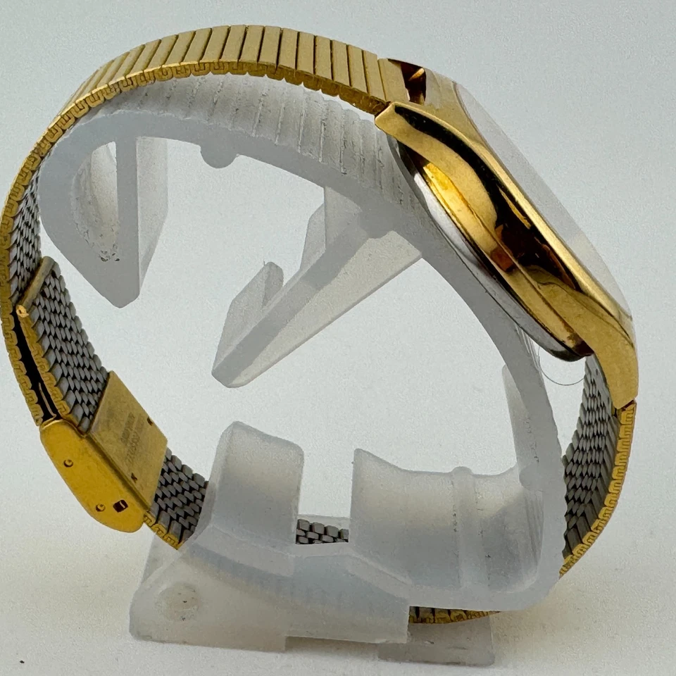 Reloj de cuarzo suizo Caravelle Bulova 8947 vintage para hombre tono dorado barril batería nueva Foto 3 de 4