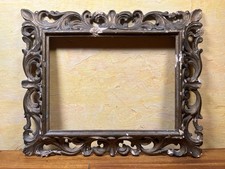 Cornice intagliata in legno con ricco decoro a volute - inizi 900