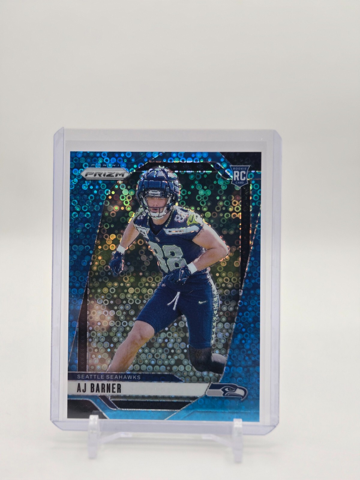 AJ Barner 2024 Panini Prizm No Huddle Blue Prizm 18/99 #304, Seahawks