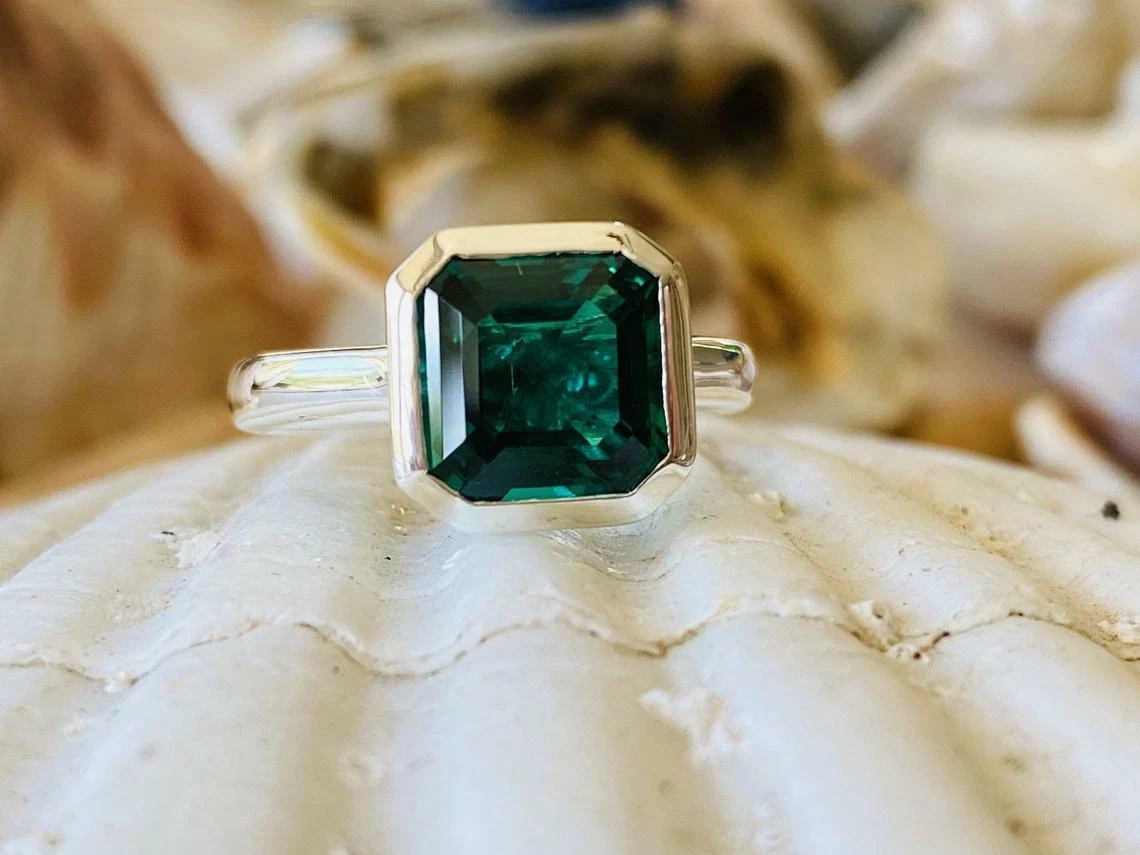 Asscher cut shop emerald engagement ring