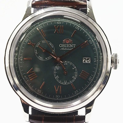 With box working beautiful Orient F6B2 UAG0 AT automatic day date green dial men