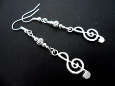 A PAIR OF  TIBETAN SILVER MUSICAL NOTE TREBLE CLEF THEMED   EARRINGS. NEW.
